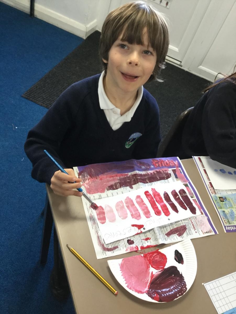 Paint. Creating value scales by adding black and white