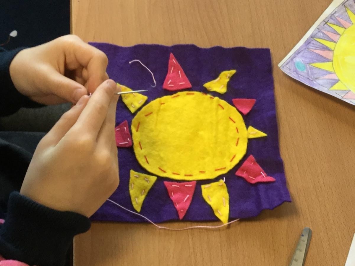 Textiles. Aztec sun