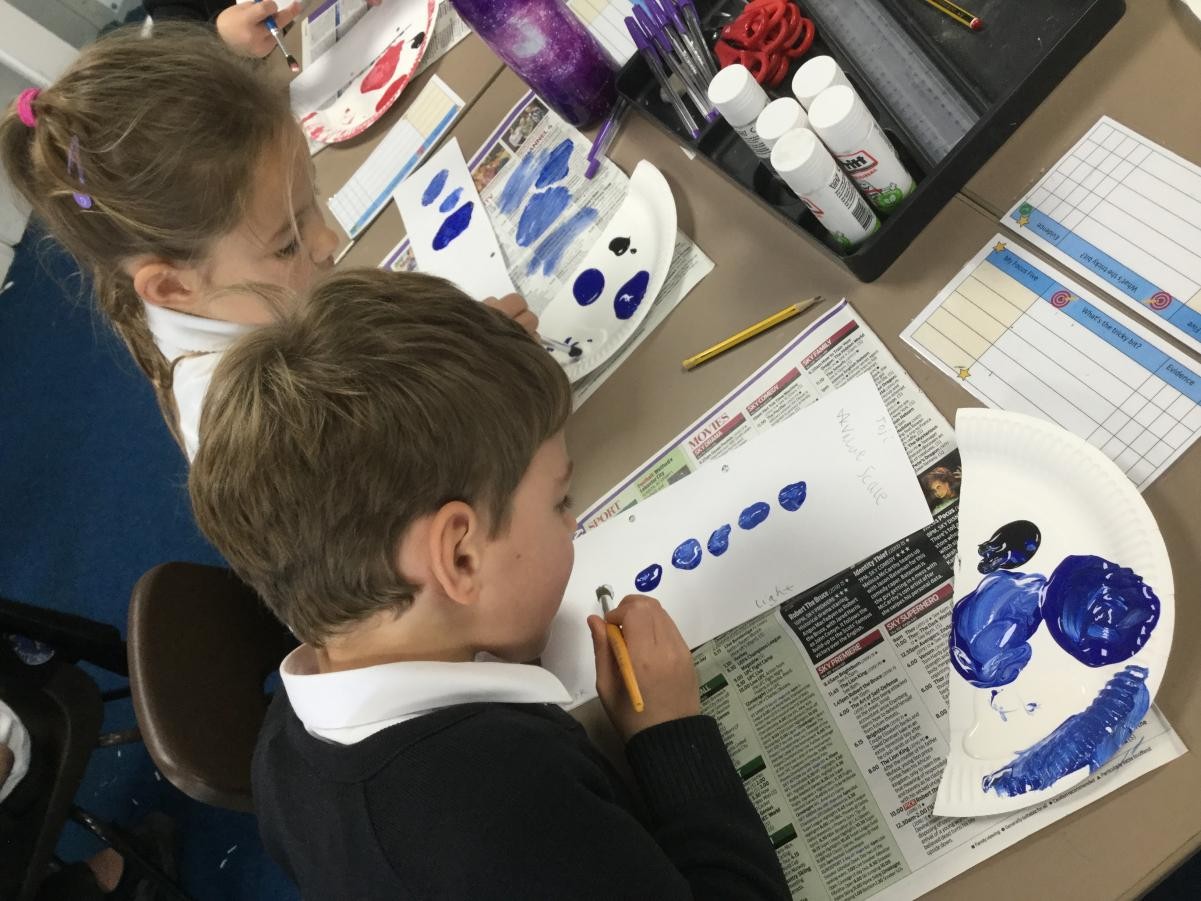 Paint. Creating value scales by adding black and white