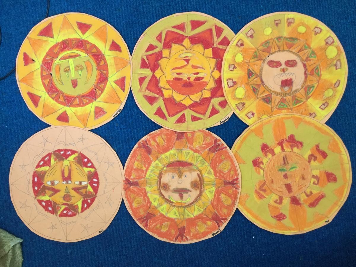 Drawing. Radial Aztec inspired oil pastel sun stones.