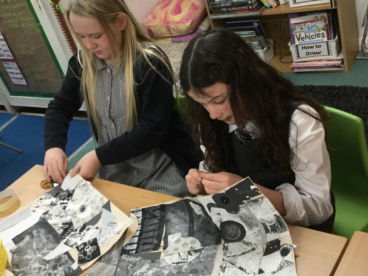 Textiles. Adding stitching and embellishments to collage work.