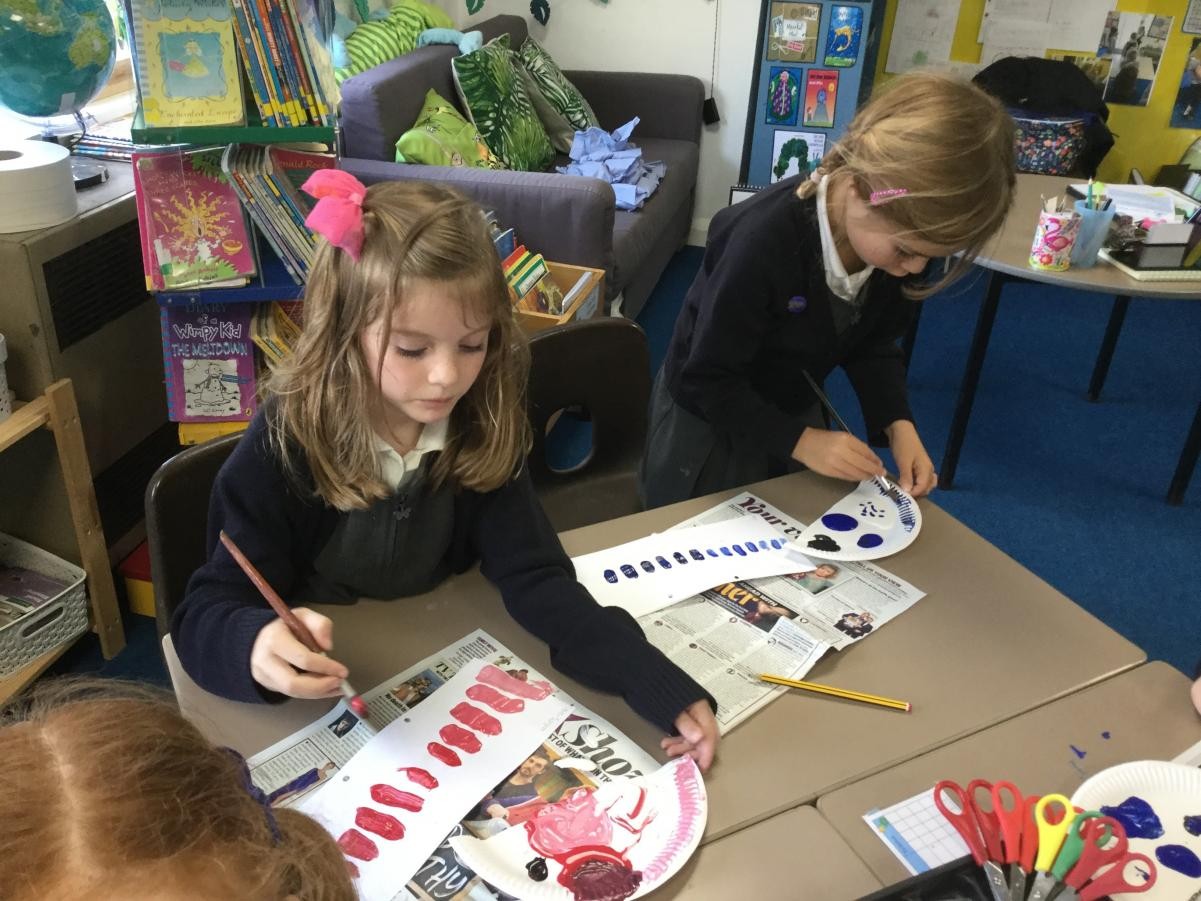 Paint. Creating value scales by adding black and white