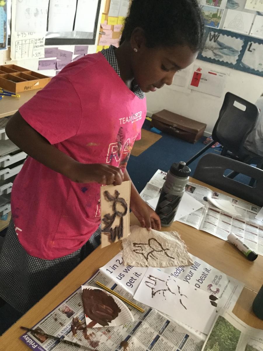 Print. Stone Age images onto natural tie dyed fabric