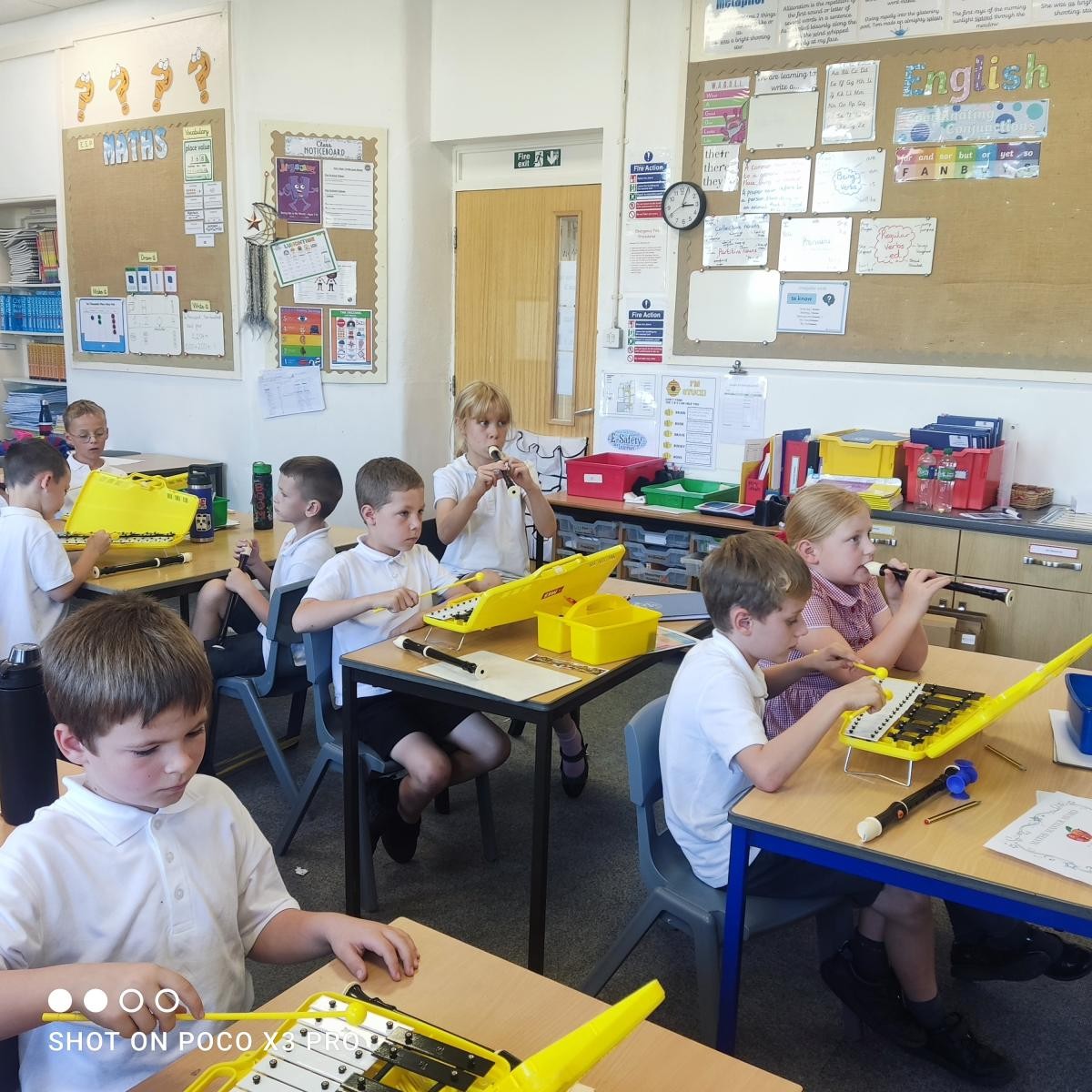 Playing 'Mama Mia' by Abba.