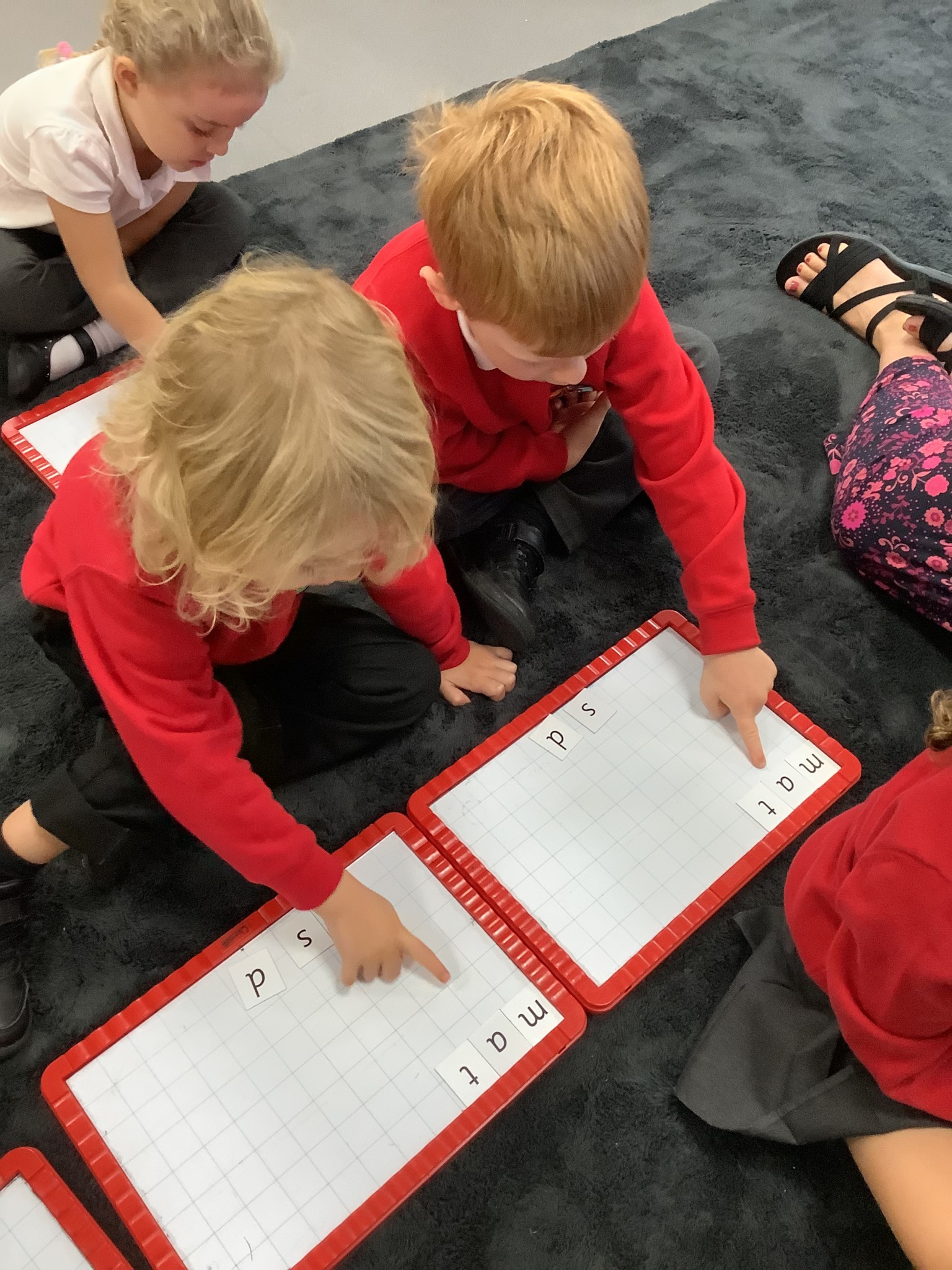 Using magnetic boards to make words
