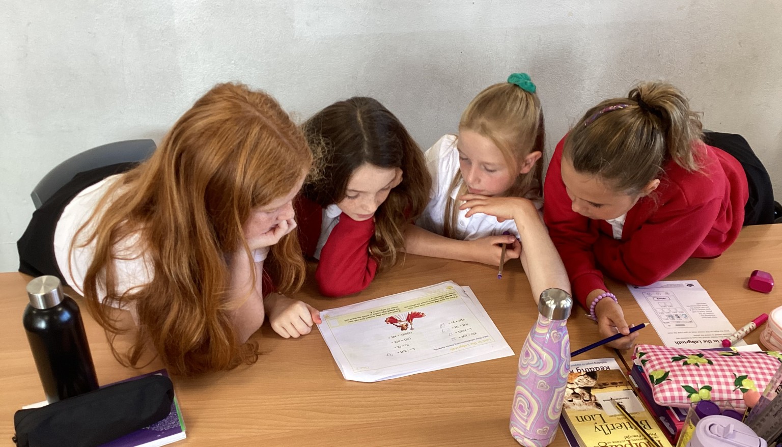 Class 4 working in teams to problem solve in maths