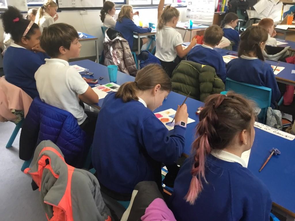 Year 5 practicing the skills of blending and tonal grading with watercolour!