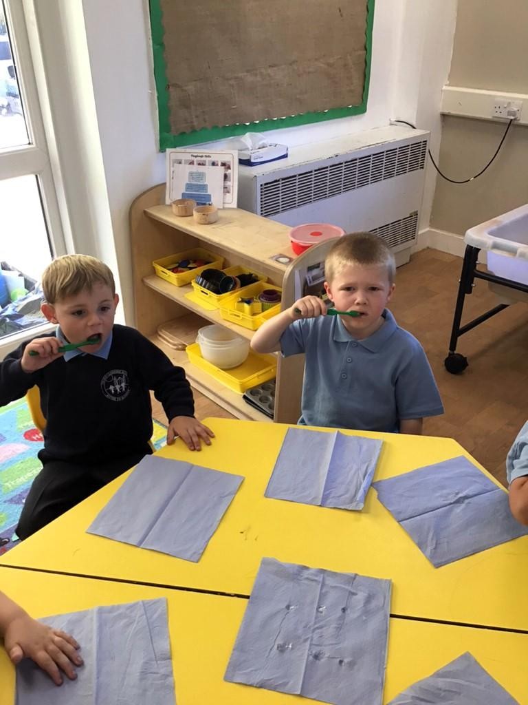 We brush our teeth at school every day! 