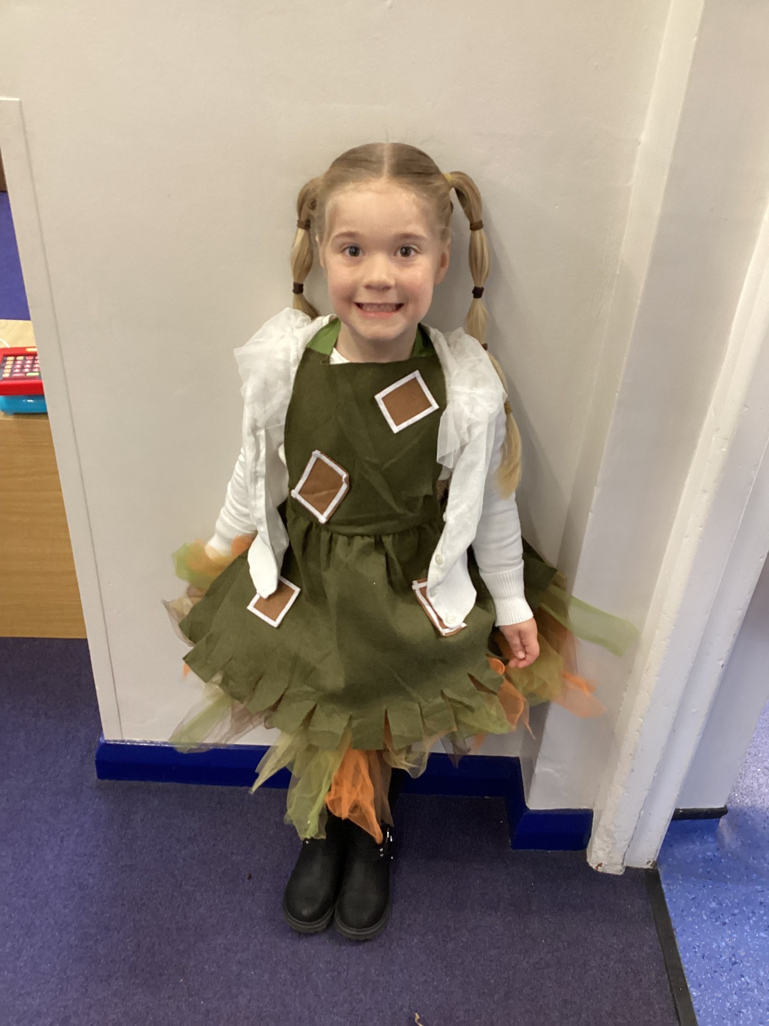 The children all dressed up as scarecrows for their Harvest Assembly.