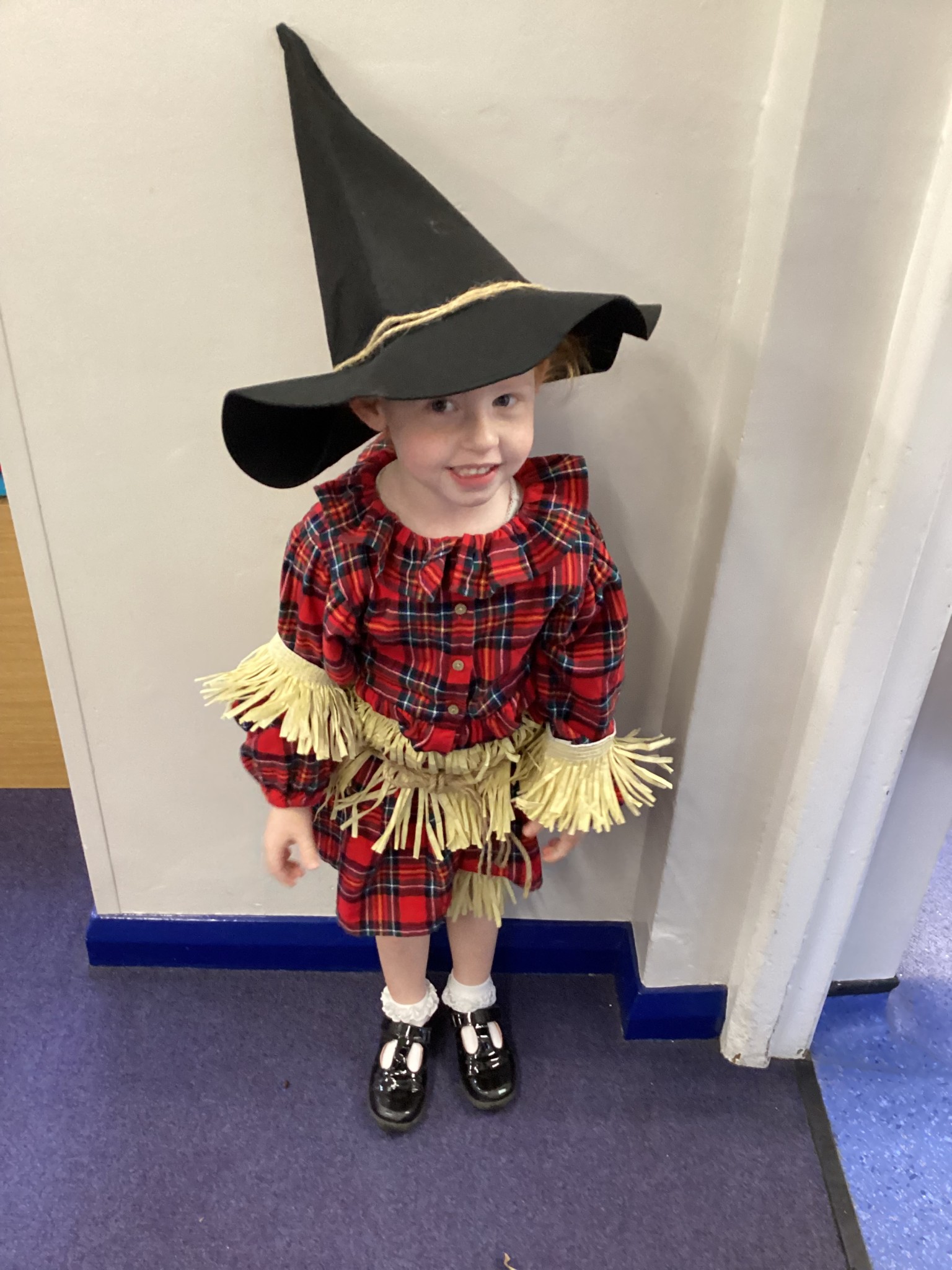 The children all dressed up as scarecrows for their Harvest Assembly.