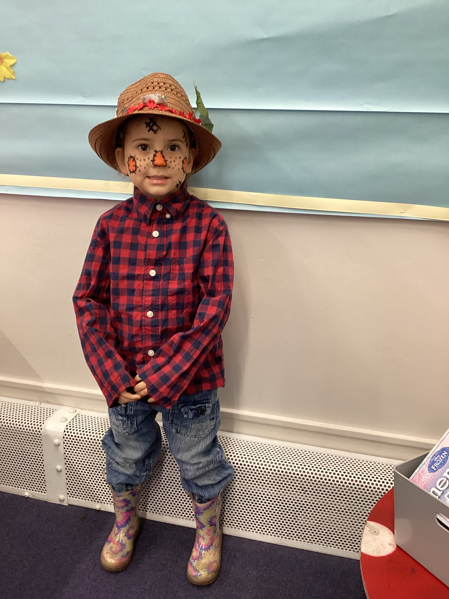 The children all dressed up as scarecrows for their Harvest Assembly.