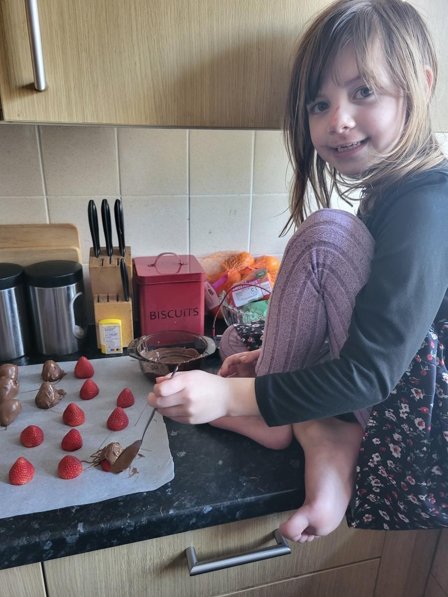 Hannah helped Dad to make a shopping list and made chocolate covered strawberries! My favourite!