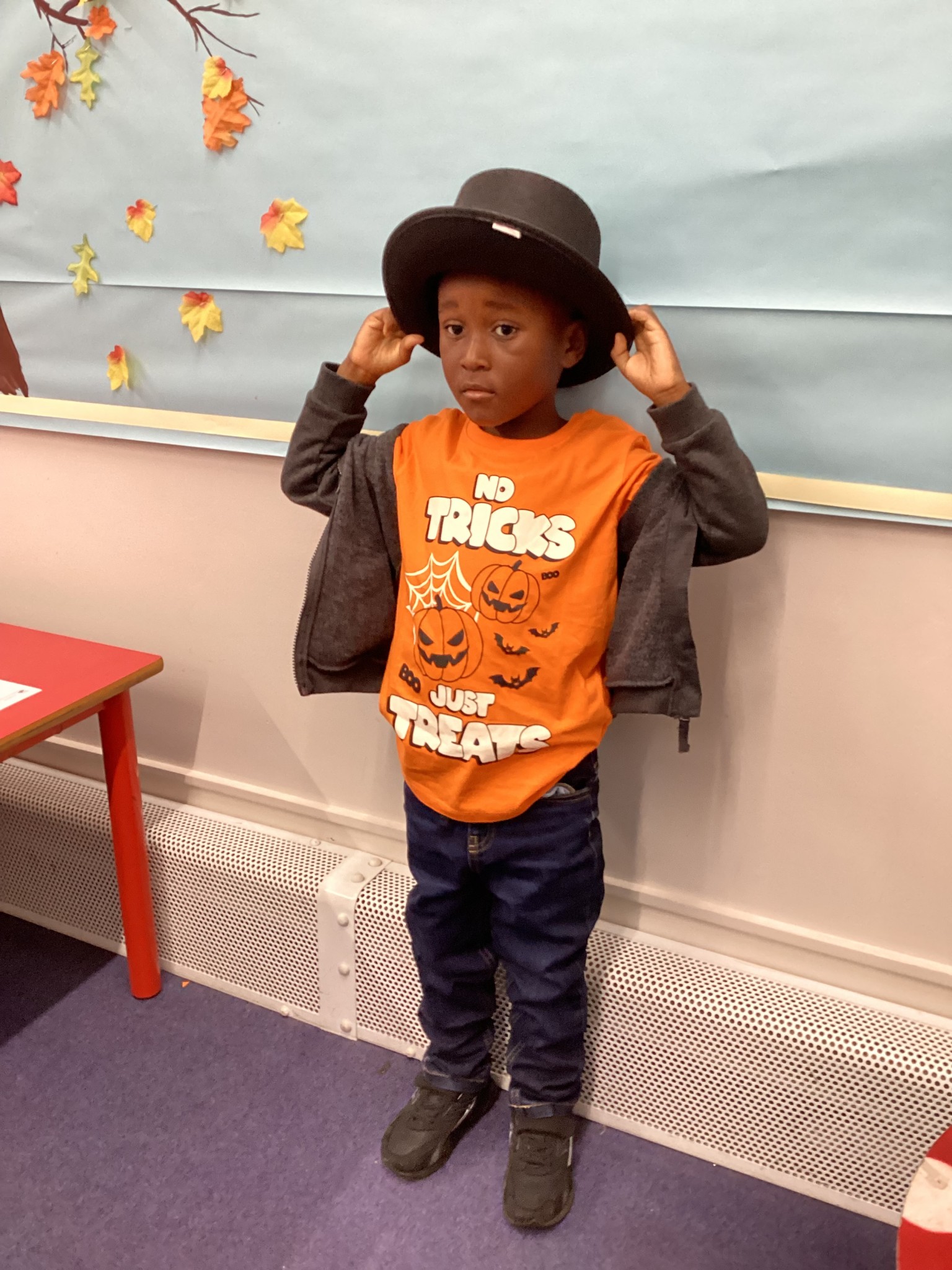The children all dressed up as scarecrows for their Harvest Assembly.