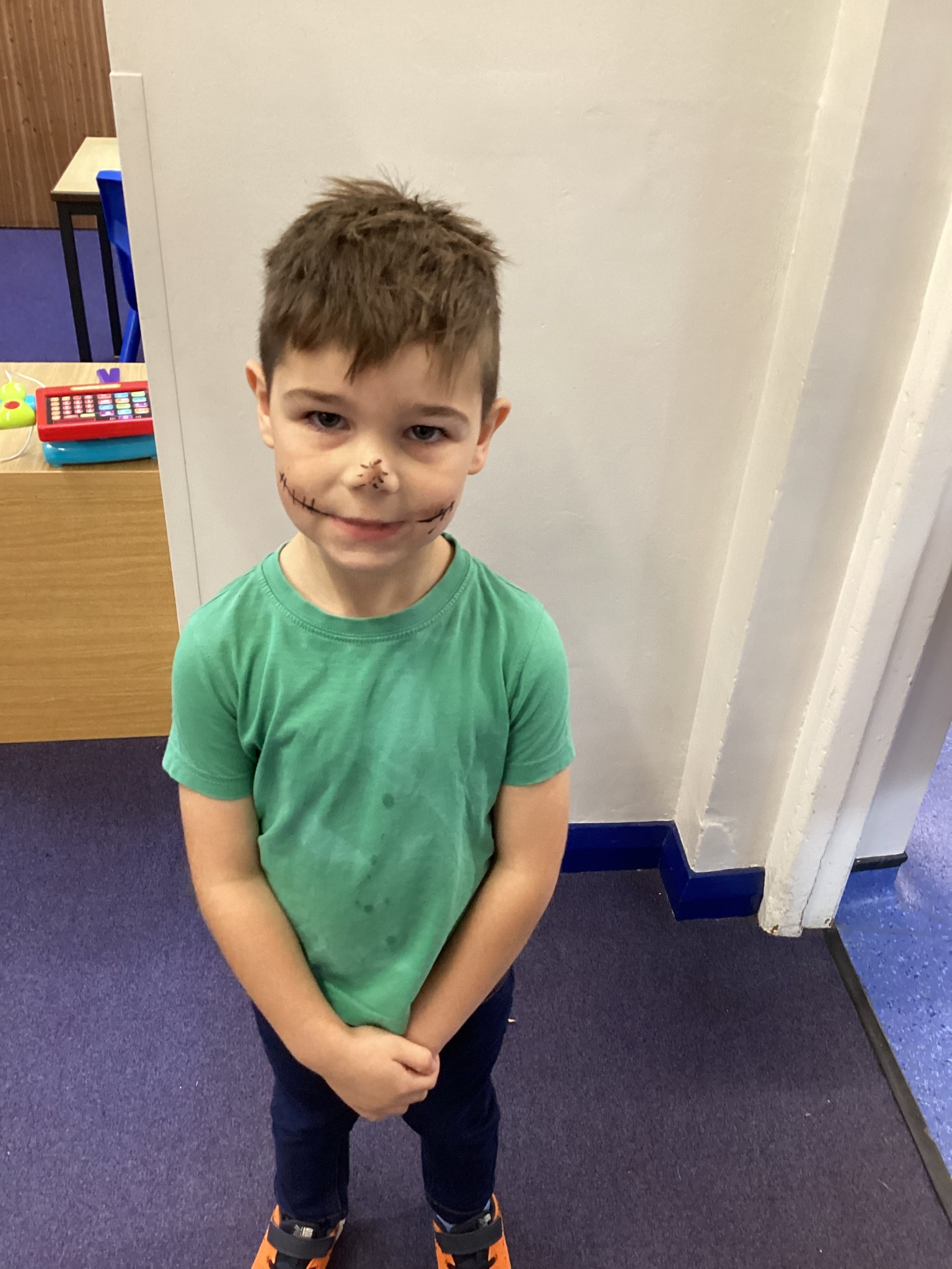 The children all dressed up as scarecrows for their Harvest Assembly.