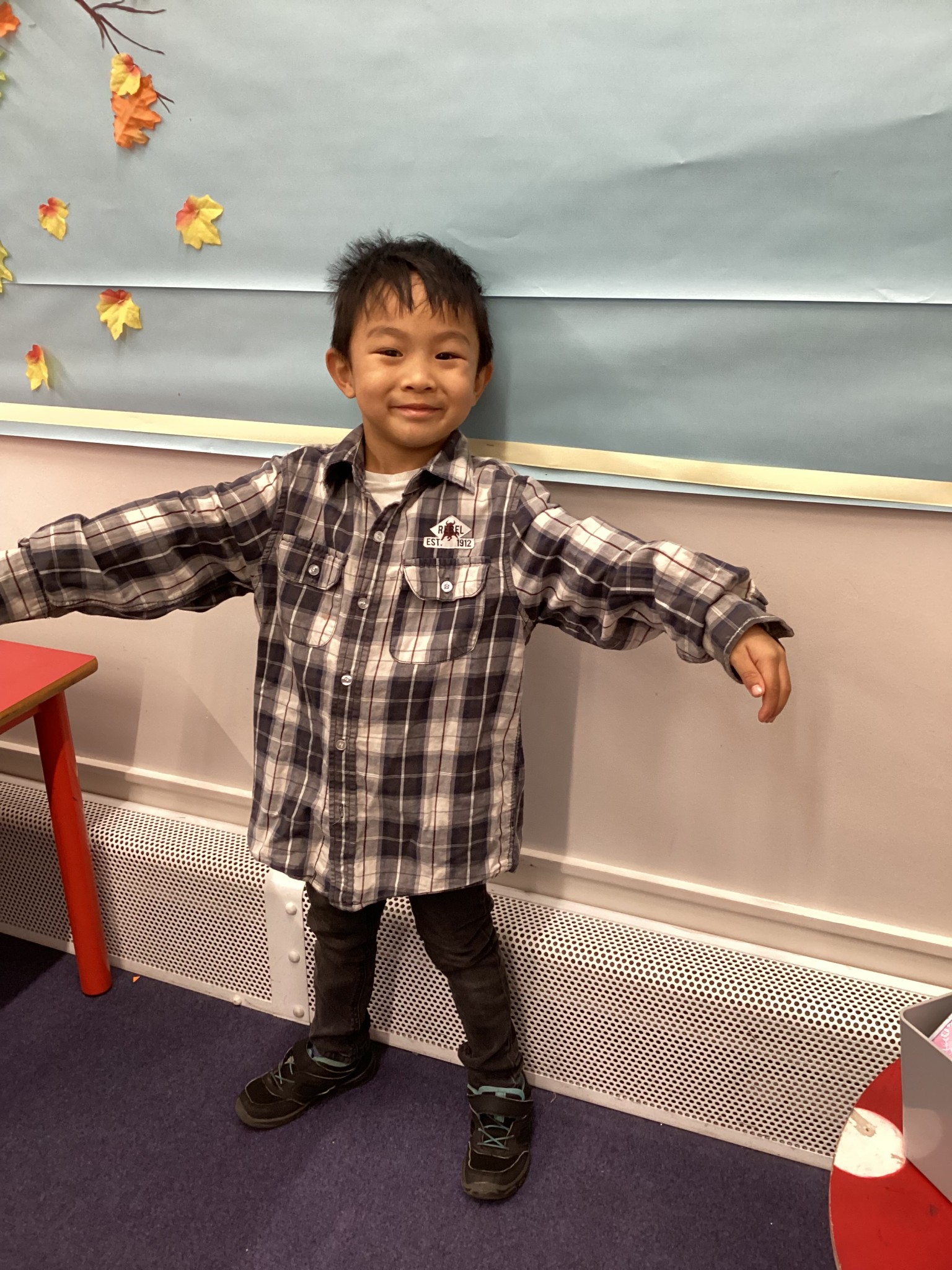 The children all dressed up as scarecrows for their Harvest Assembly.