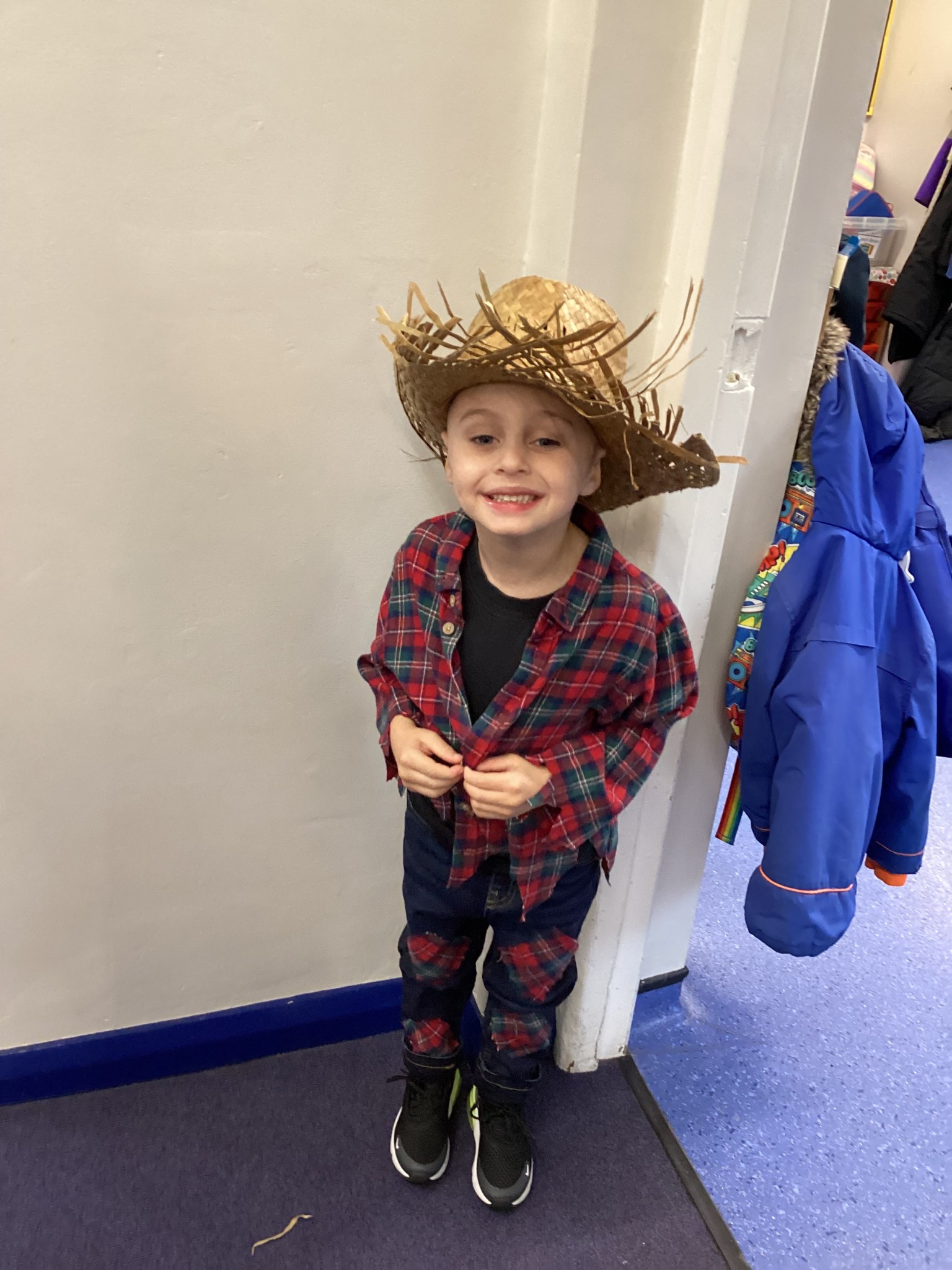 The children all dressed up as scarecrows for their Harvest Assembly.