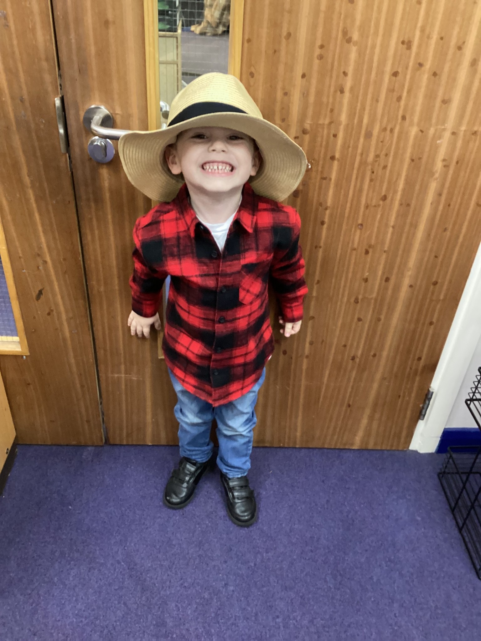 The children all dressed up as scarecrows for their Harvest Assembly.
