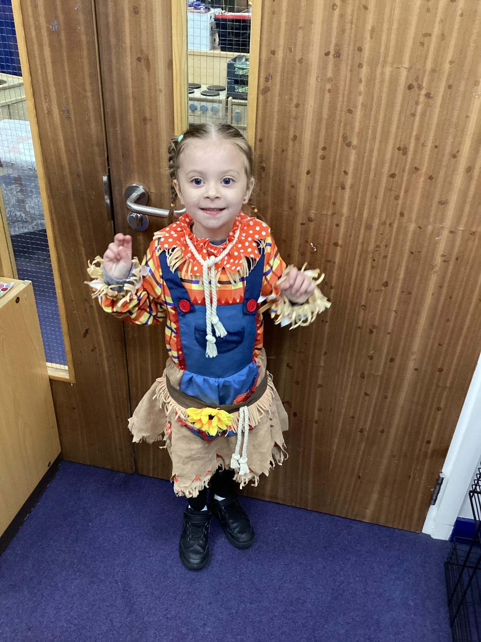 The children all dressed up as scarecrows for their Harvest Assembly.