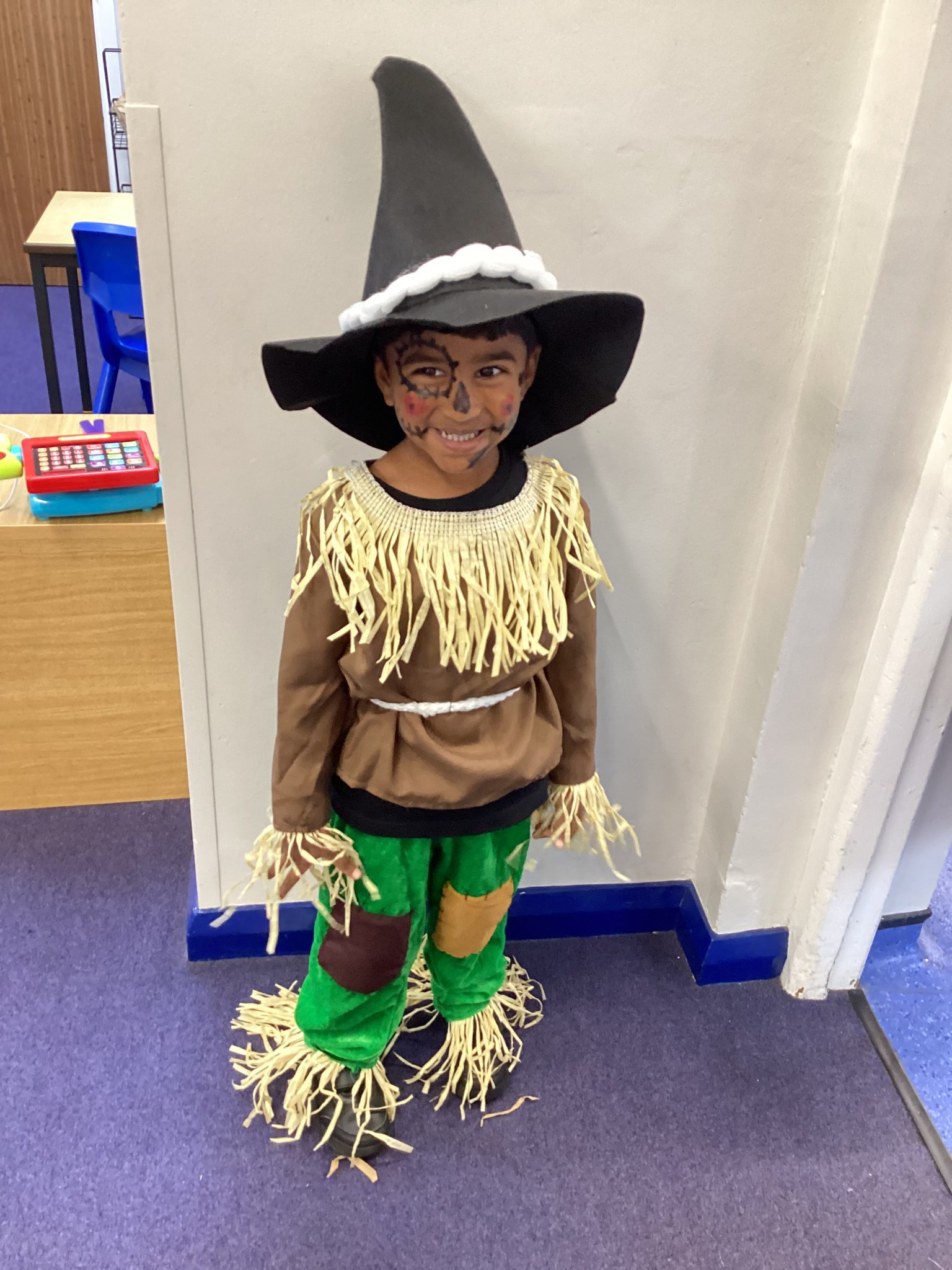 The children all dressed up as scarecrows for their Harvest Assembly.