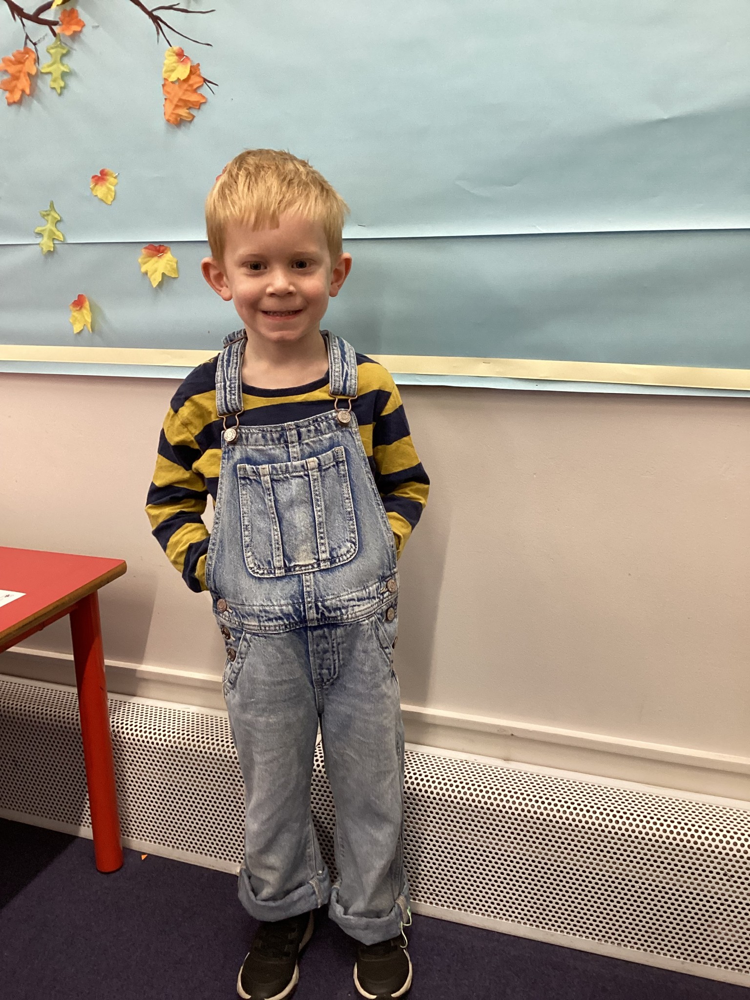 The children all dressed up as scarecrows for their Harvest Assembly.