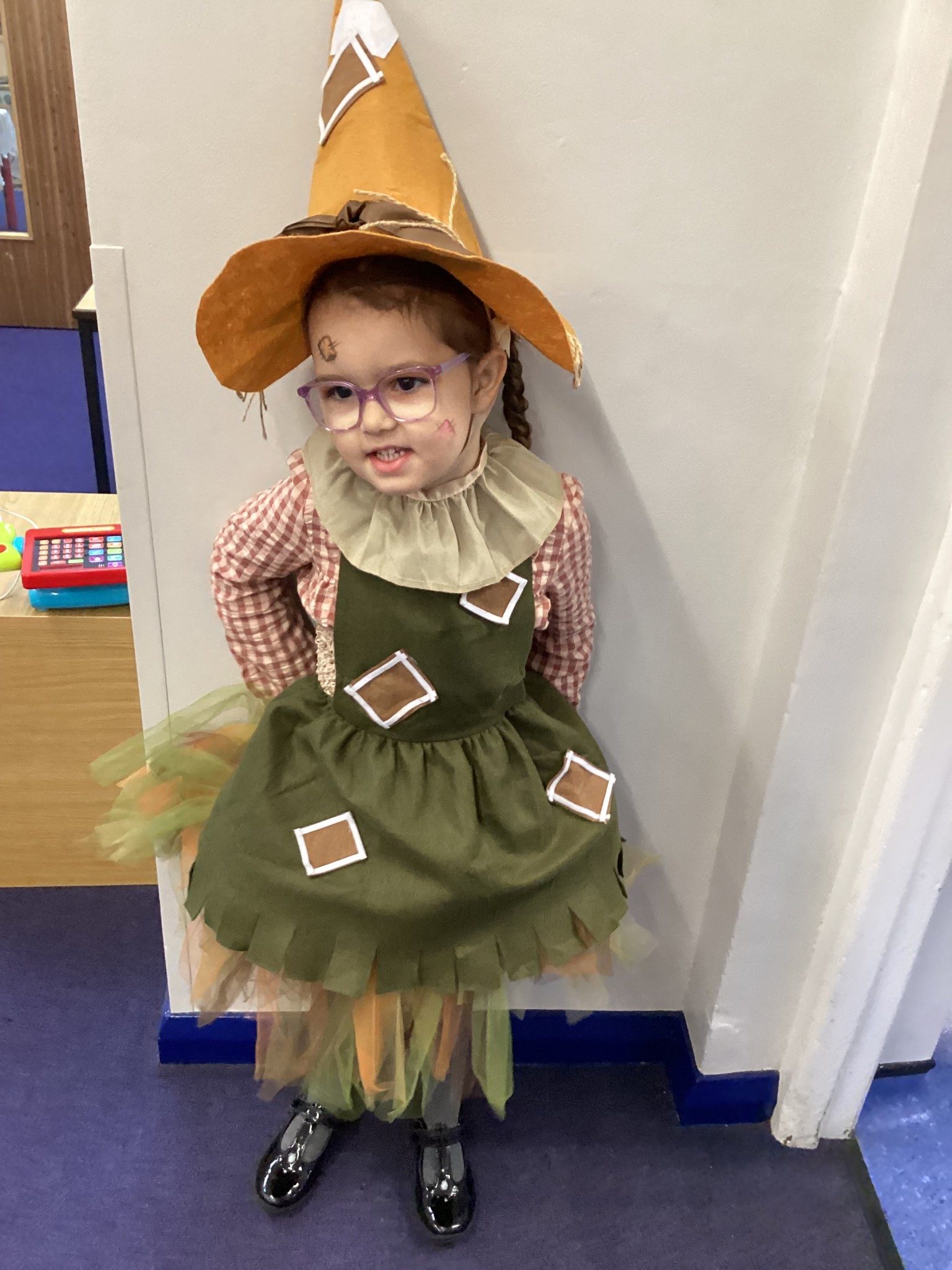 The children all dressed up as scarecrows for their Harvest Assembly.