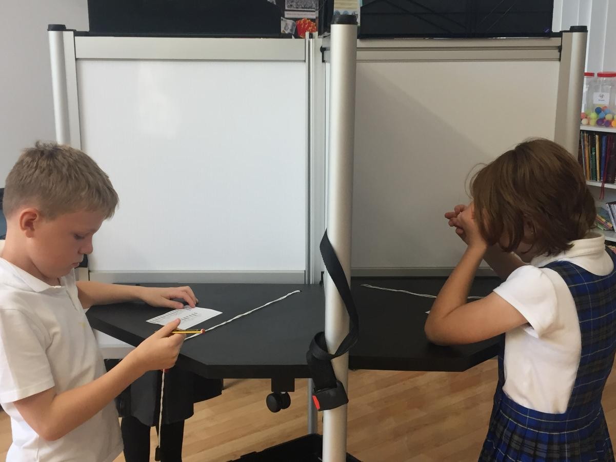 We registered to vote and then voted in the polling stations set up across school.