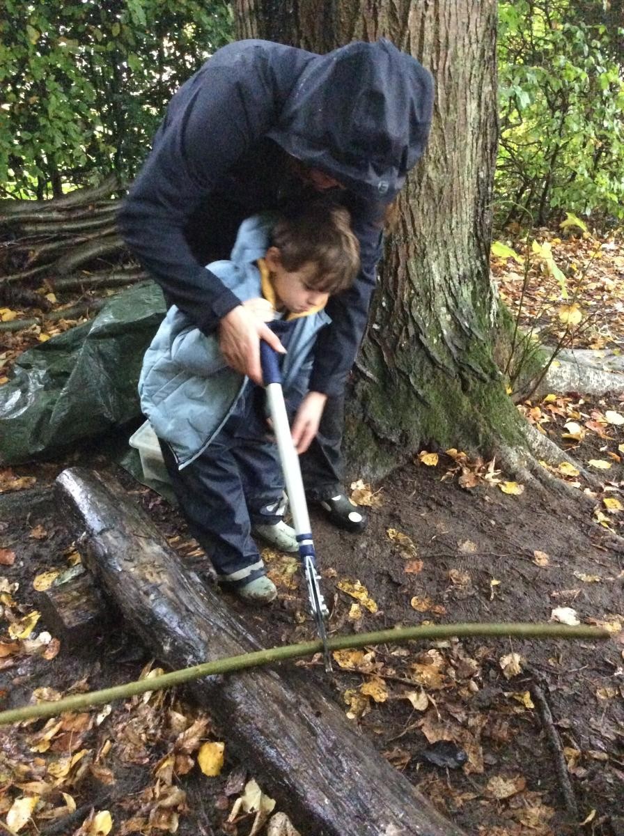 We measured the willow and cut a piece the same length as our arm.