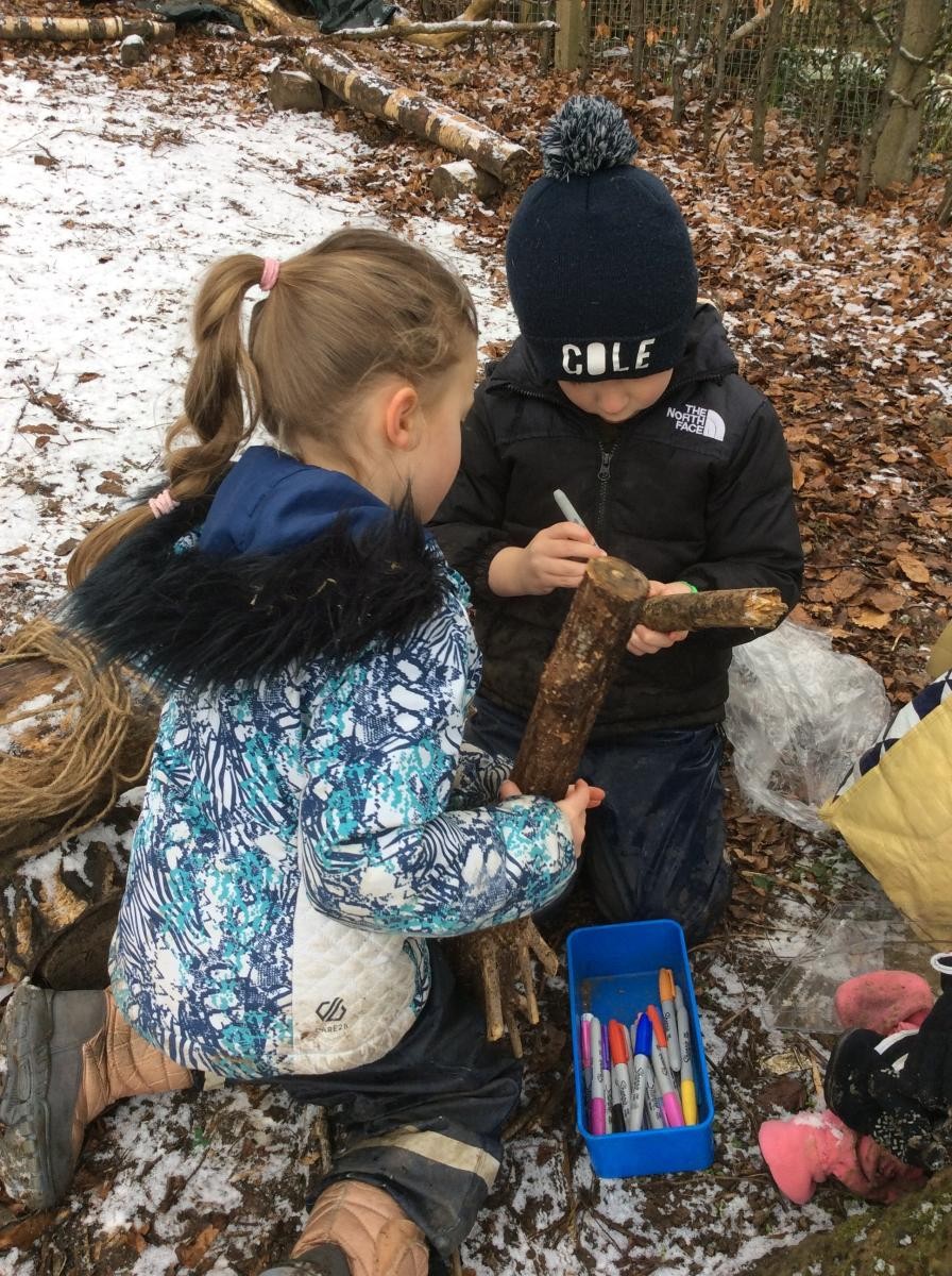 We drew faces on our log dogs.