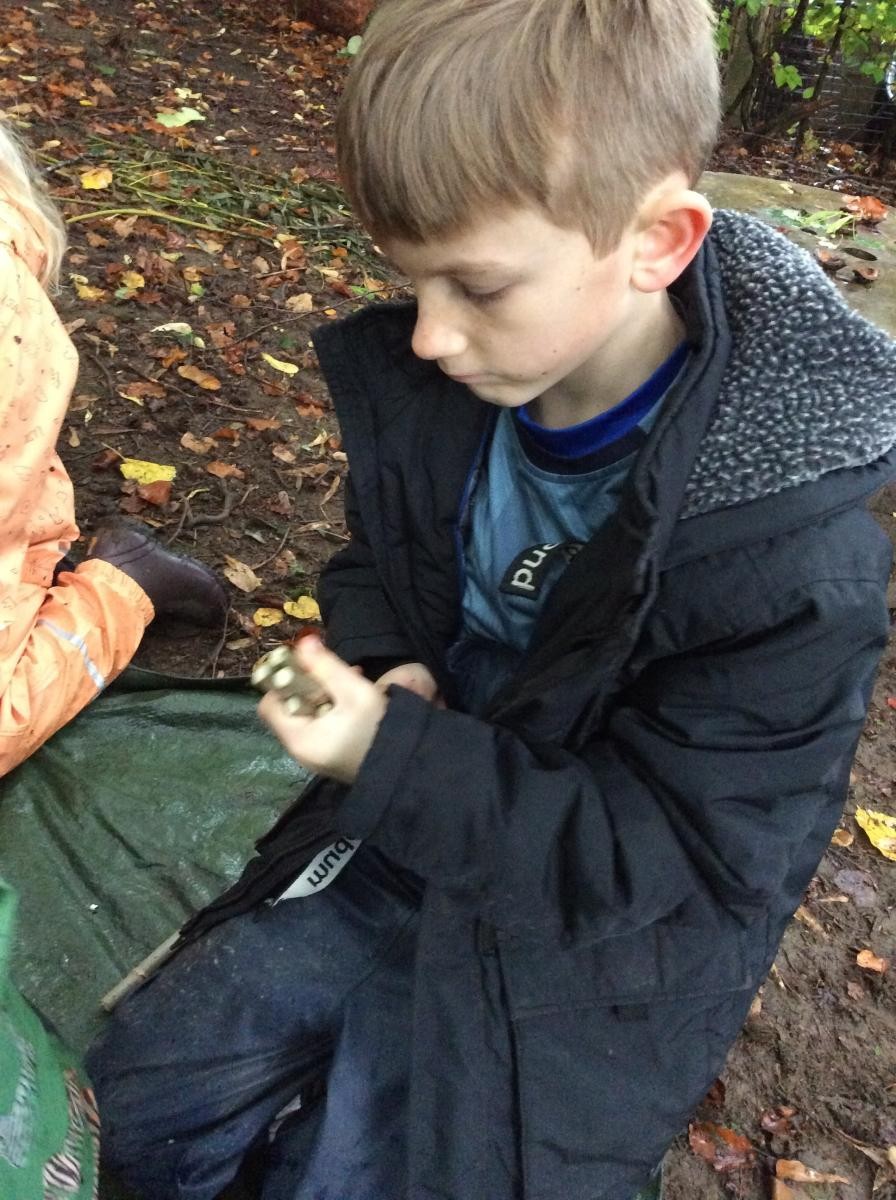 We made beads and jewellery using elder sticks.