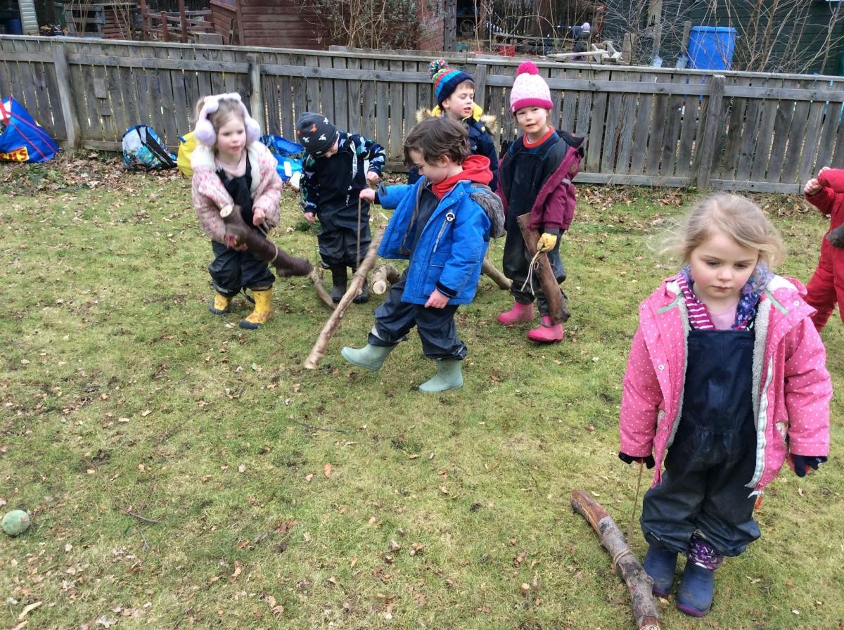 We took our log dogs for a walk on the field. 