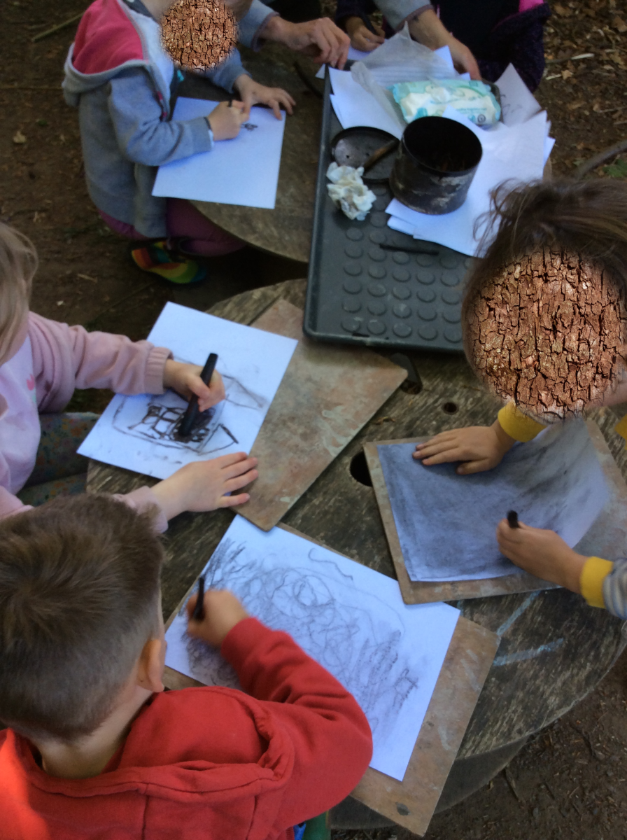 We don't have a cave to do our artwork in, so we used paper to draw on with the charcoal that we made last week.