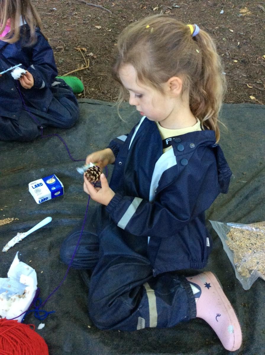 We made bird feeders with pine cones, lard and bird seed.