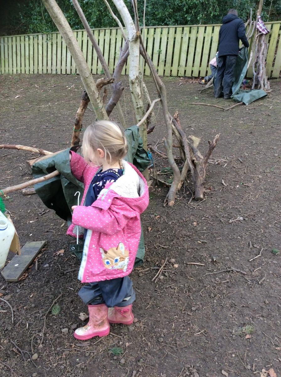 We made dens with the tarpaulins.