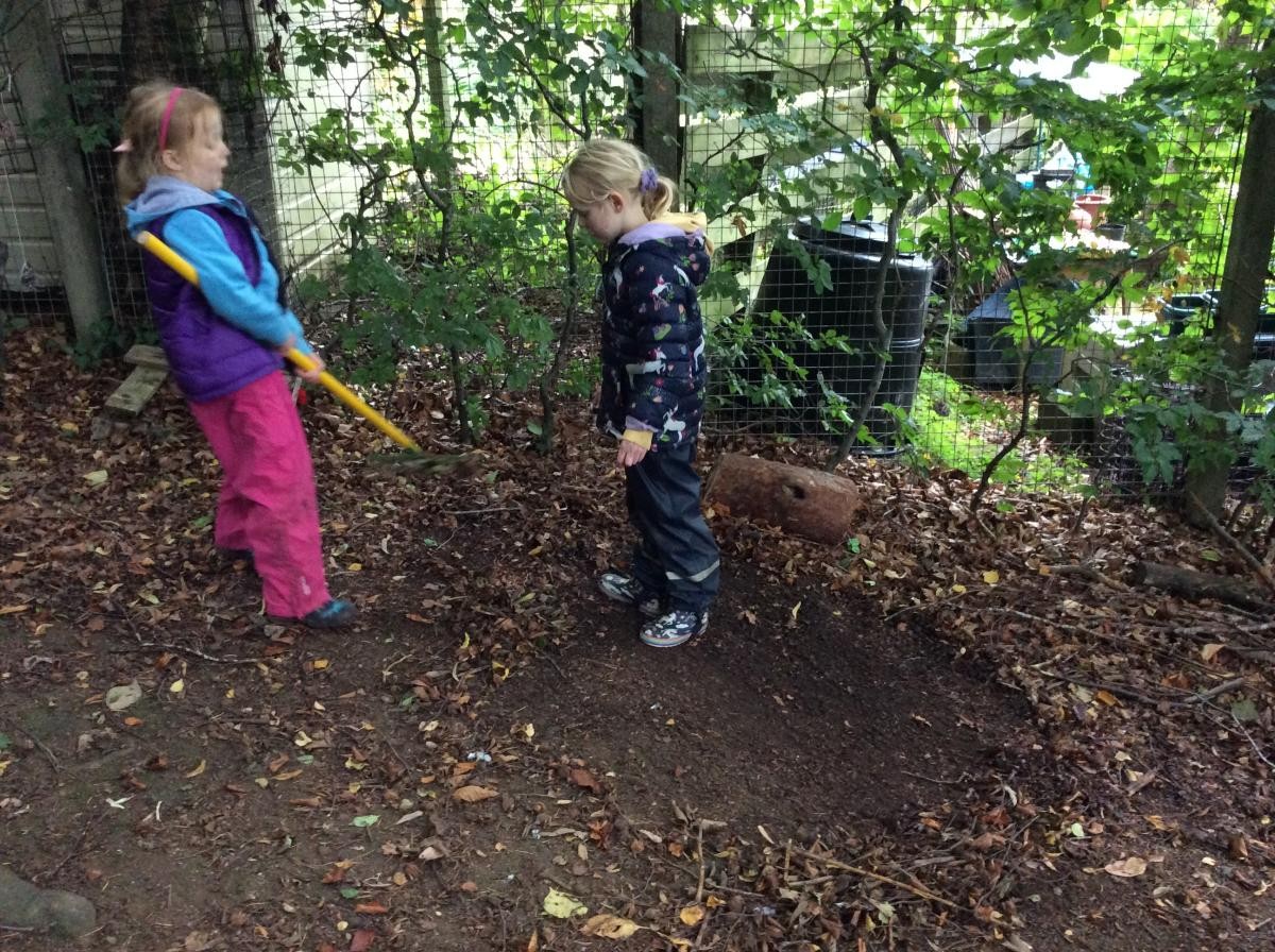 Clearing a space to make an animal home.