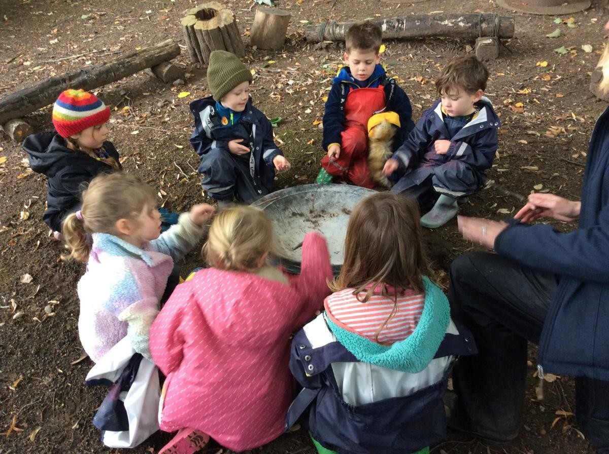 October 2nd. Reception Class practised approaching and kneeling at an unlit fire today so that we are safe when we cook on the fire next week.
