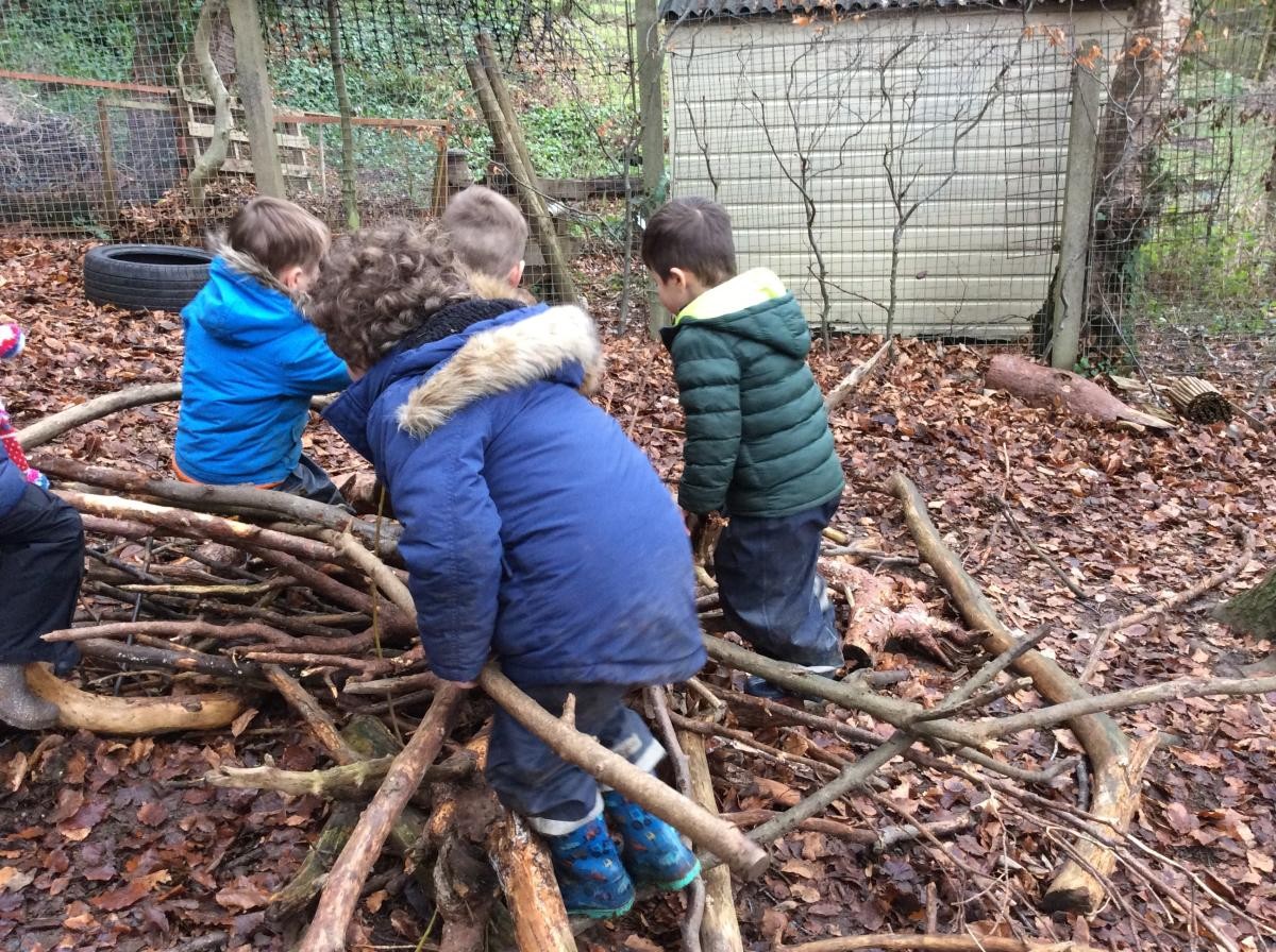 We love building with branches and sticks.