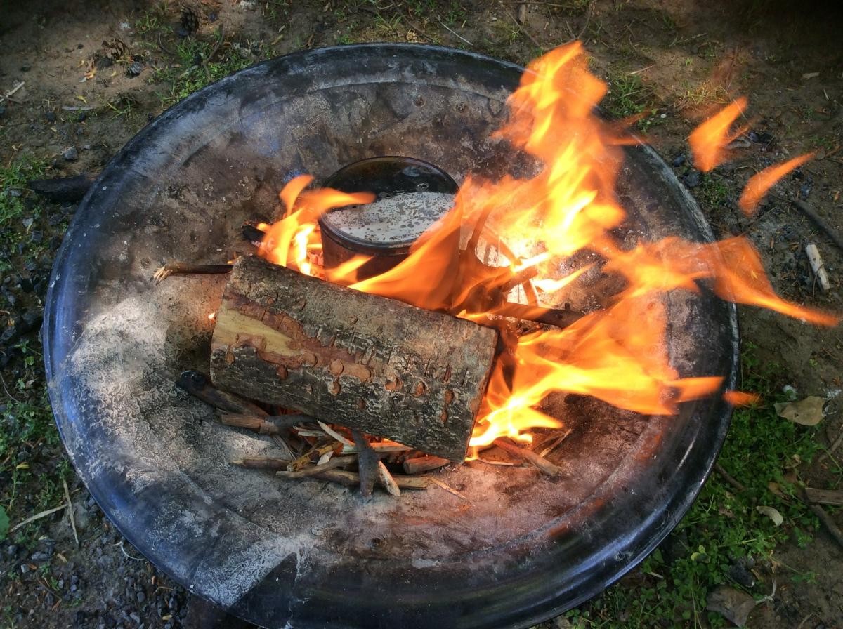 We put the charcoal tin (filled with last week's peeled willow) in the fire and left it there until steam stopped coming out of the holes.