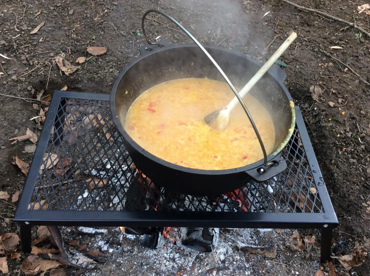 Then we added garlic, ginger, spices, tomatoes, coconut milk, stock and lentils and left it to cook.