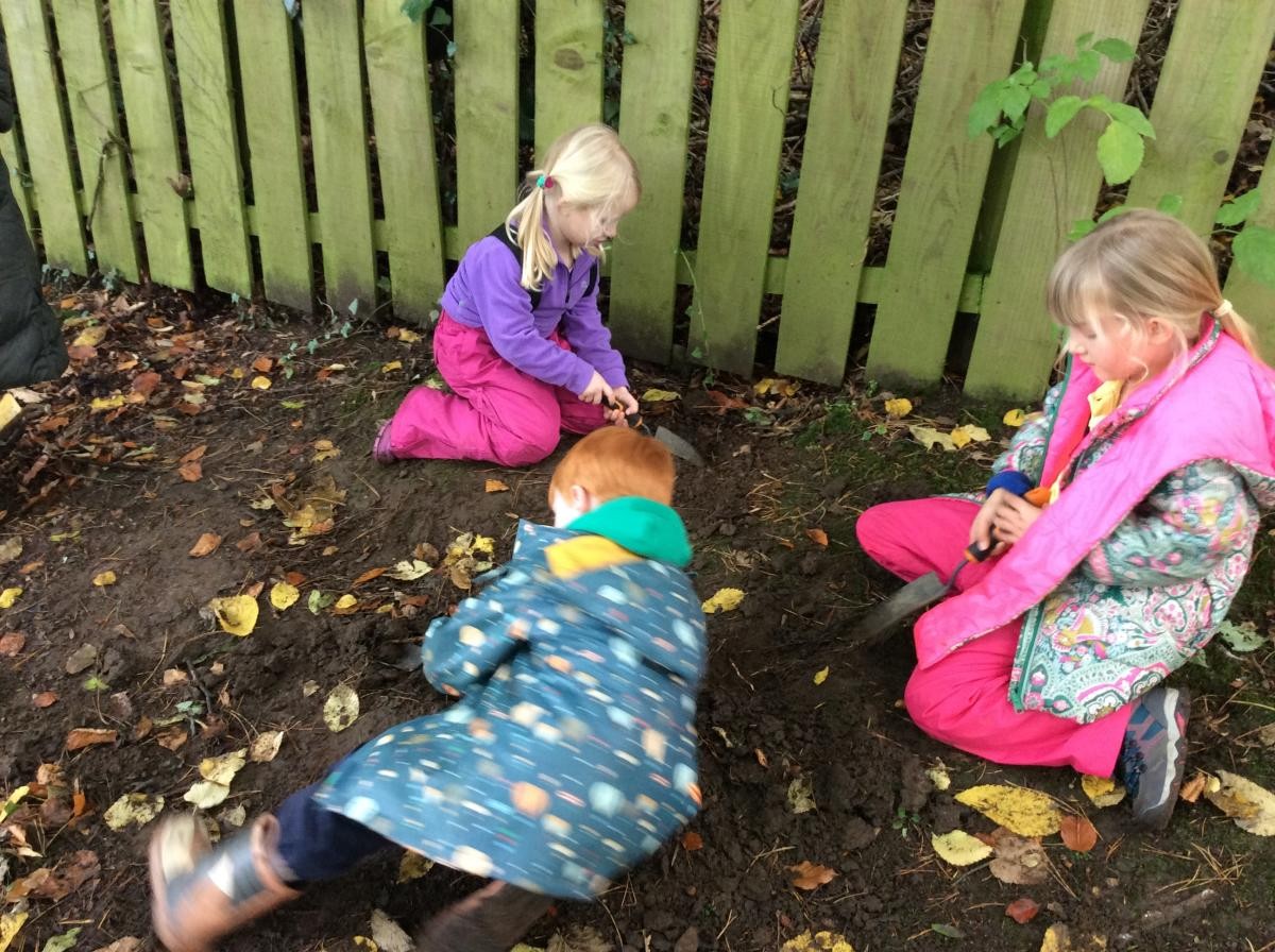 We love digging in forest school.