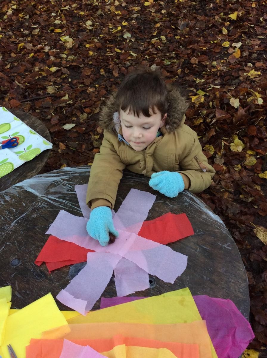 We placed a conker in the middle of some strips of crepe paper.