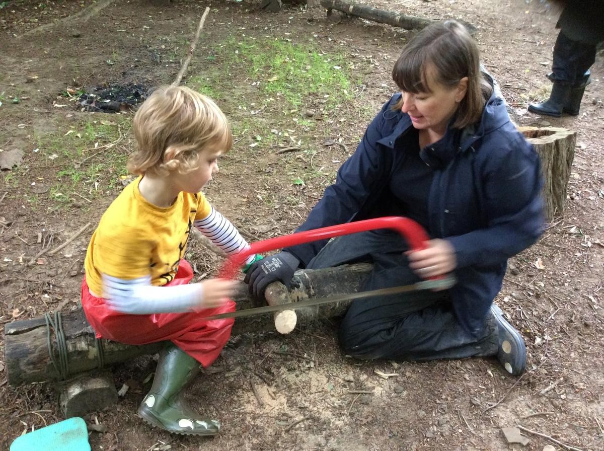 We learned how to use the bow saw to cut a disc of wood off a dead branch.