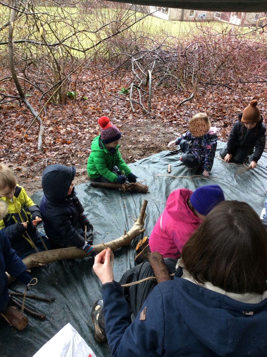 Then we all found a log to make our own log dog. We used a lark's foot knot to attach a string lead to our log dog.