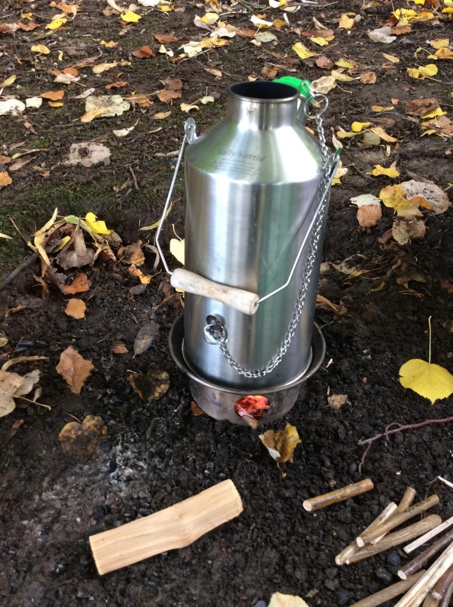 The kelly kettle was put on to boil water.