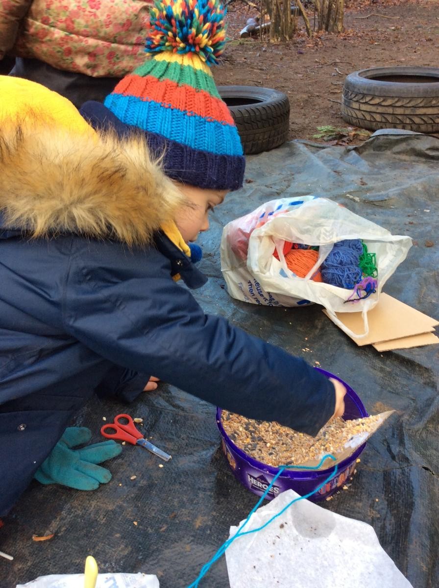 Next we sprinkled bird seed onto the lard.