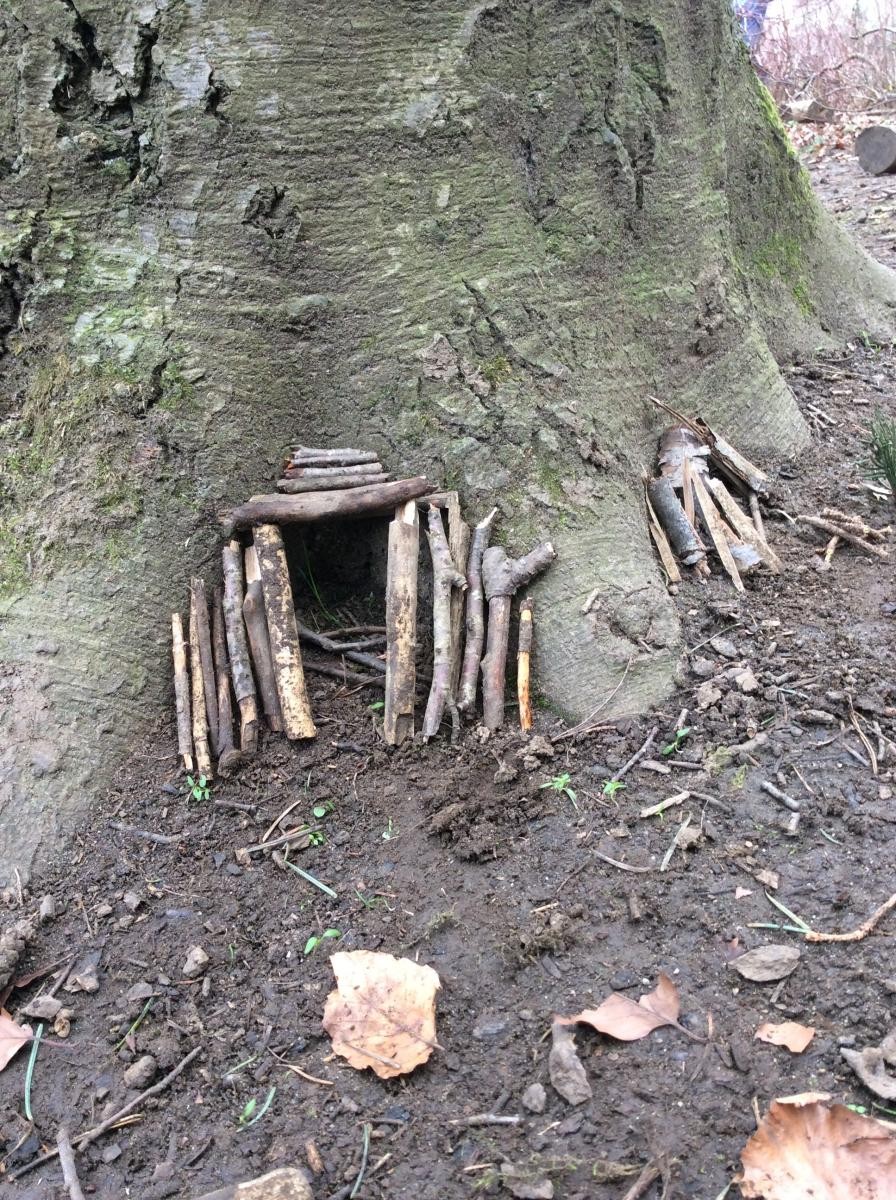 This tiny fairy house looks very inviting.