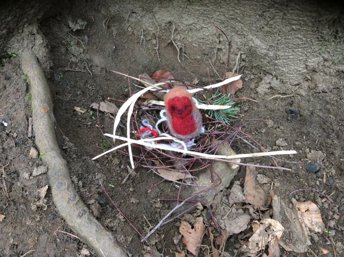 We listened to bird song in the woods and talked about how, when and where birds make their nests. Then we built some nests for Little Robin.