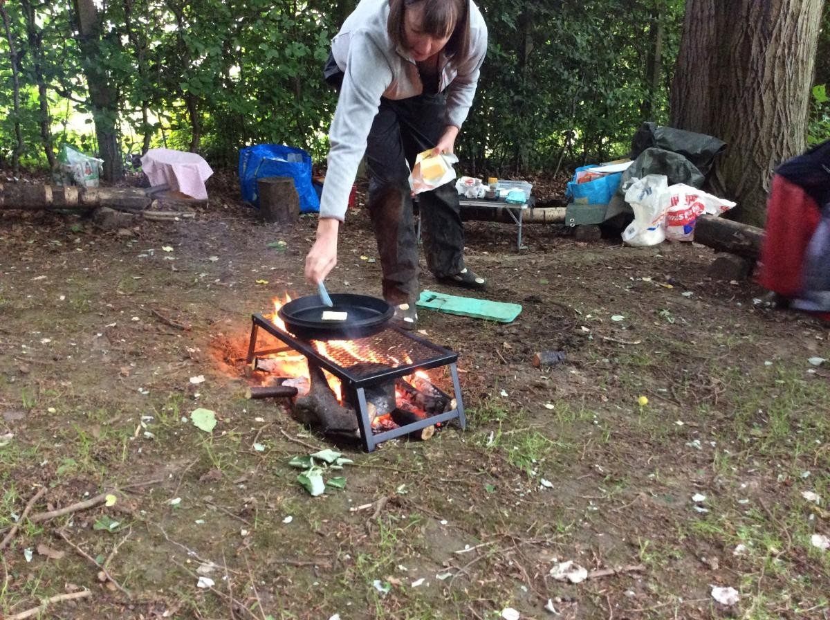 We got the pan hot on the fire and melted some butter.