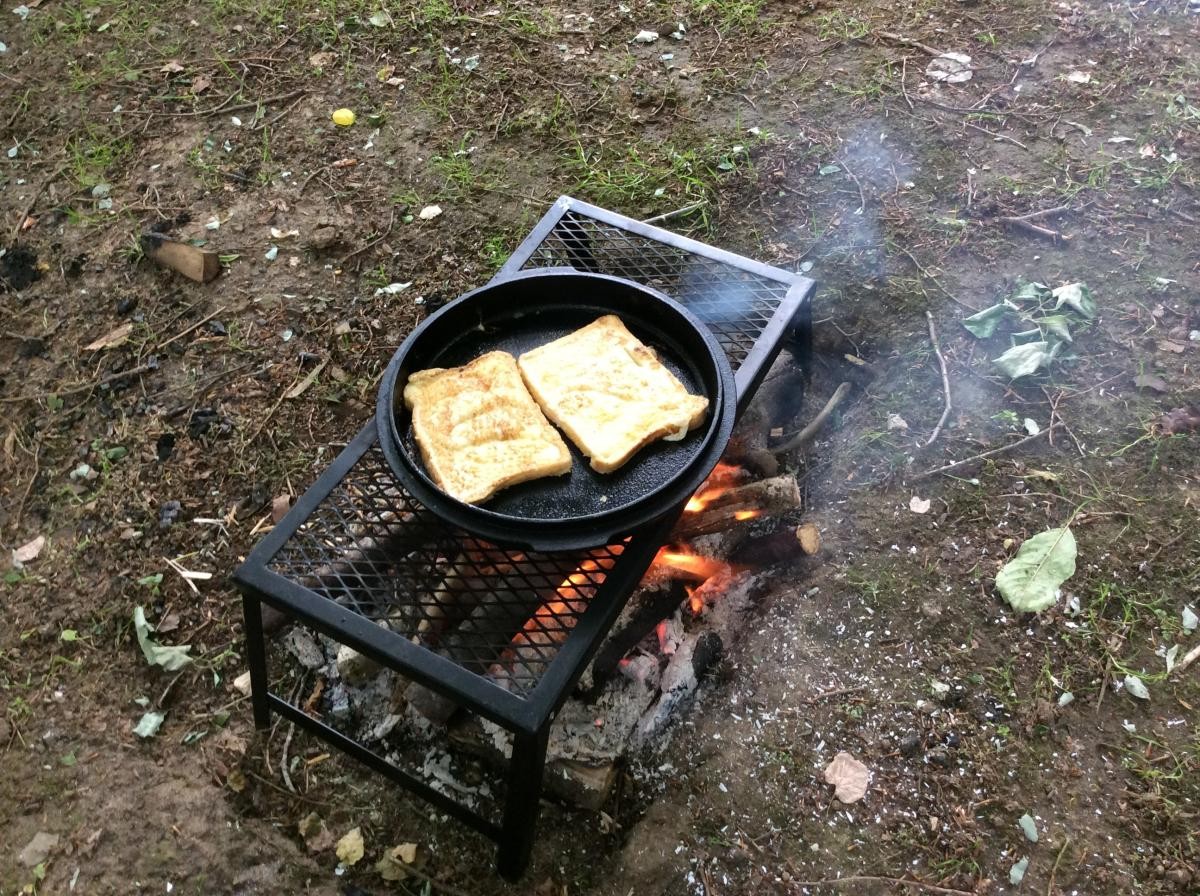 We dipped slices of bread into the egg mixture and cooked it over the fire.