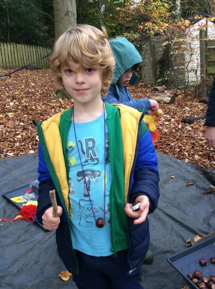 We made some conker necklaces.