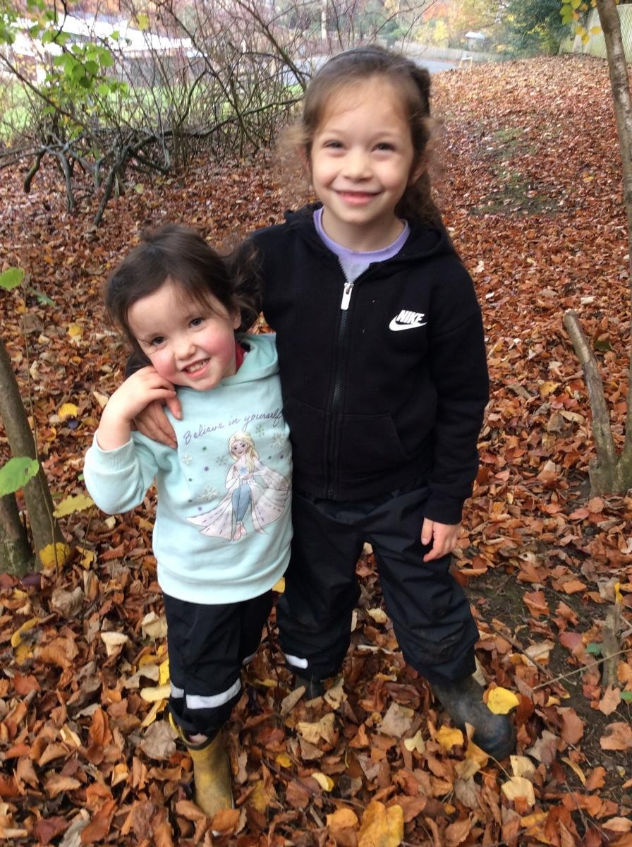 We love playing with our friends in Forest School.